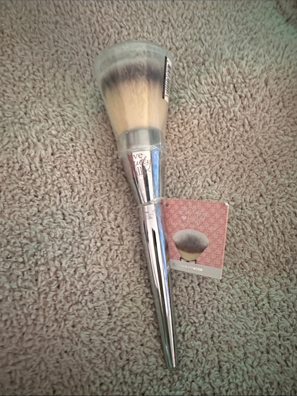 It cosmetics all over powder brush. New with travel case.